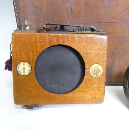 178 - A London Stereoscopic Co. Folding Studio Plate Camera, mahogany and brass with leather bellows and a... 