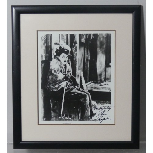 200 - WITHDRAWN - A black and white film still reprint of Charlie Chaplin in “The Gold Rush” (1925) wearin... 