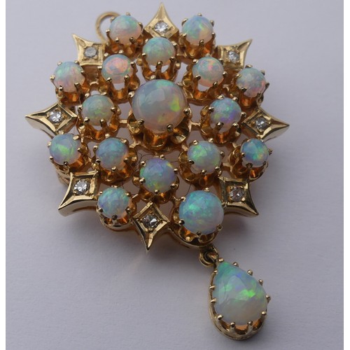 220 - An antique style opal and diamond Pendant / Brooch, the starburst cluster set seventeen circular cab... 