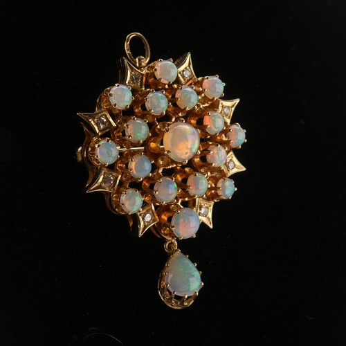 220 - An antique style opal and diamond Pendant / Brooch, the starburst cluster set seventeen circular cab... 