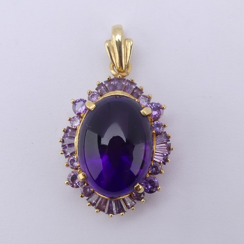 221 - A cabochon amethyst Pendant, the oval central amethyst approx. 17.5mm long, above a surround of pale... 