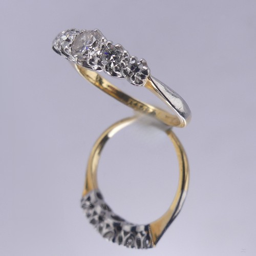 160 - A graduated five stone diamond Ring, the centre stone approx. 0.22ct, all claw set in platinum, on a... 