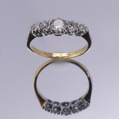 160 - A graduated five stone diamond Ring, the centre stone approx. 0.22ct, all claw set in platinum, on a... 