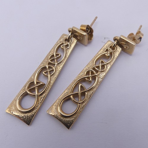 223 - Ola Gorie; a Scottish 9ct yellow gold Pendant, the plaque pierced with Celtic design, 4.5cm long, on... 