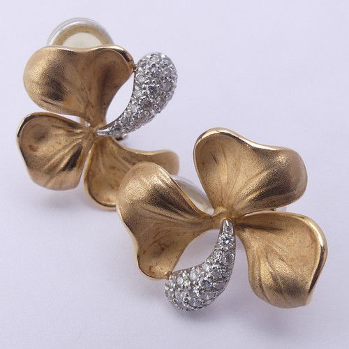 306 - A pair of 18ct gold and diamond Shamrock Earrings, the pavé set diamond stem with three matt ... 