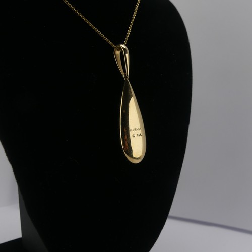 224 - A 14ct yellow gold, onyx and diamond Pendant, by Kabana, the pear shaped drop with five panels of bl... 