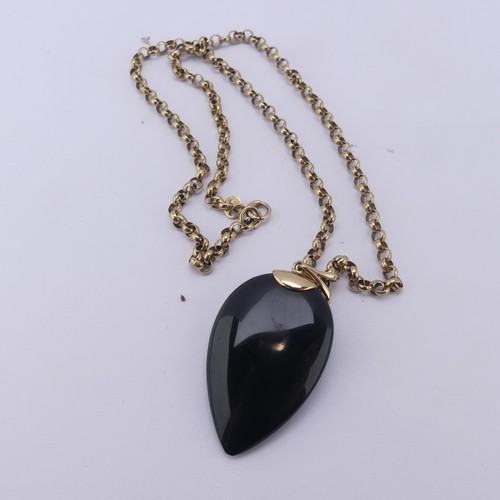 225 - A 9ct gold mounted Whitby Jet Pendant, the pear shaped stone suspended from a 9ct gold split bale, 4... 