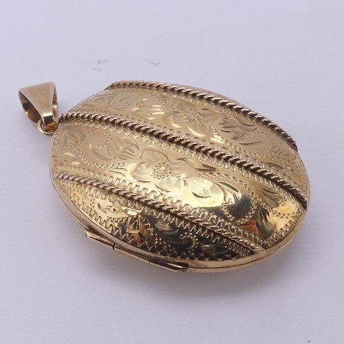 229 - A 9ct yellow gold oval double hinged Locket, in the Victorian style, the front with foliate decorati... 