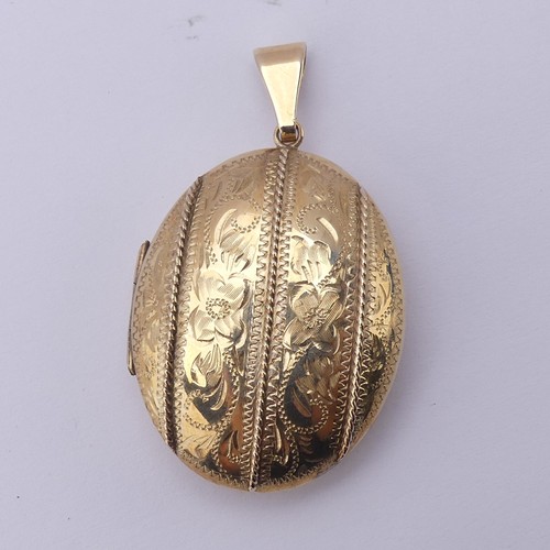 229 - A 9ct yellow gold oval double hinged Locket, in the Victorian style, the front with foliate decorati... 