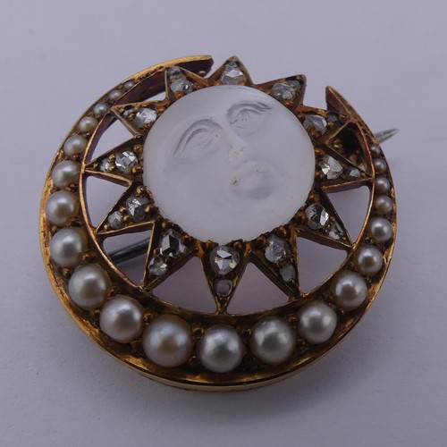 308 - A Victorian 'Man-in-the-Moon' Brooch, the central carved moonstone, 11mm diameter, within a star and... 