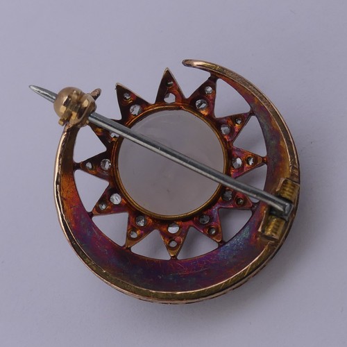 308 - A Victorian 'Man-in-the-Moon' Brooch, the central carved moonstone, 11mm diameter, within a star and... 