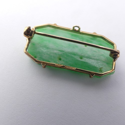 339 - A 9ct gold mounted jade Pendant / Brooch, the pierced rectangular plaque 3cm long, together with a s... 