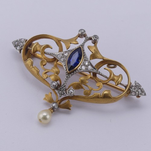 310 - An Art Nouveau sapphire and diamond Brooch, the central marquise sapphire approx. 8.6mm long, in a s... 