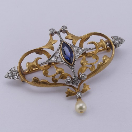 310 - An Art Nouveau sapphire and diamond Brooch, the central marquise sapphire approx. 8.6mm long, in a s... 