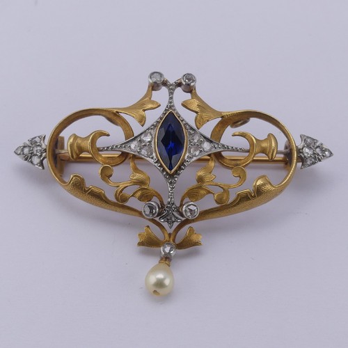 310 - An Art Nouveau sapphire and diamond Brooch, the central marquise sapphire approx. 8.6mm long, in a s... 