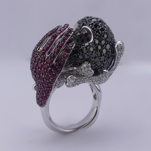 159 - A striking ruby and diamond novelty Dress Ring, in the style of Lydia Courteille, Paris, formed as a... 