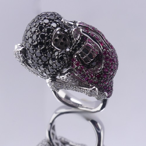 159 - A striking ruby and diamond novelty Dress Ring, in the style of Lydia Courteille, Paris, formed as a... 