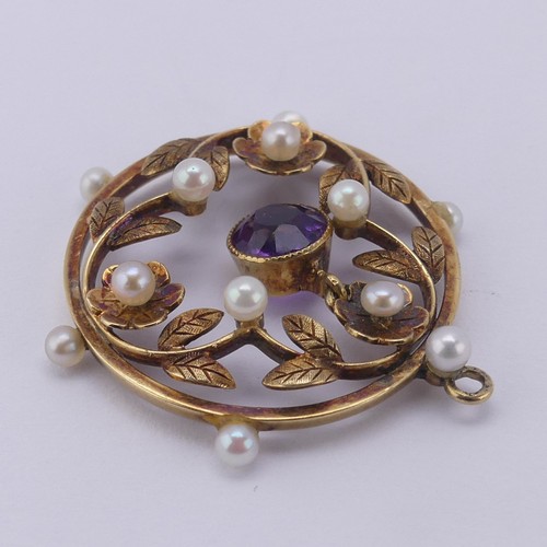 237 - An Edwardian amethyst and seed pearl Pendant, of open circular foliate design with central facetted ... 