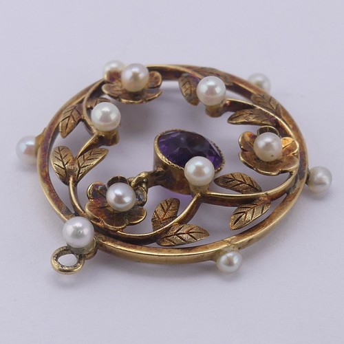 237 - An Edwardian amethyst and seed pearl Pendant, of open circular foliate design with central facetted ... 