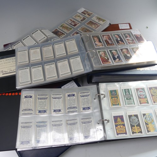 187 - Cigarette Cards: A collection in nine ring-binder albums with transparent leaves, sets and part-sets... 