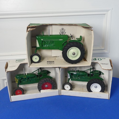 123A - A boxed Spec-cast Oliver 880 Tractor in green, together with a Spec-cast green Oliver model 440 and ... 