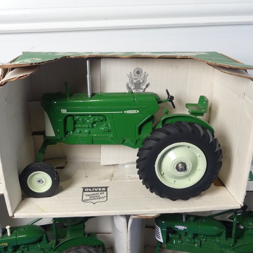 123A - A boxed Spec-cast Oliver 880 Tractor in green, together with a Spec-cast green Oliver model 440 and ... 