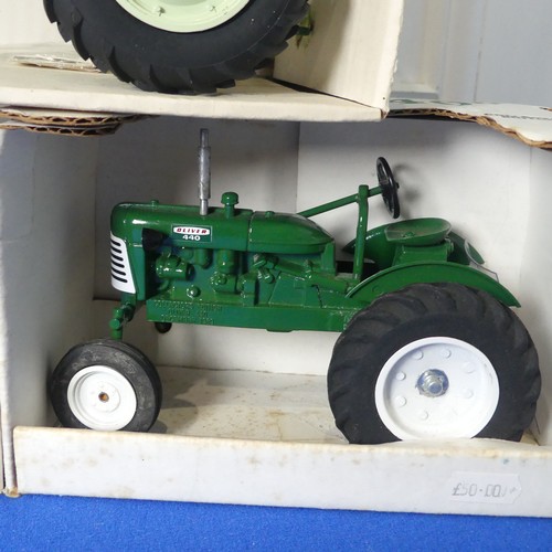 123A - A boxed Spec-cast Oliver 880 Tractor in green, together with a Spec-cast green Oliver model 440 and ... 