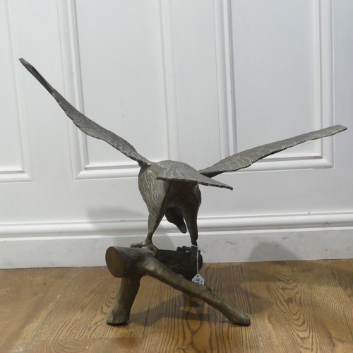 350A - An early 20th century bronze model of an Eagle, perched on a tree branch, W:61cm x H:33cm... 