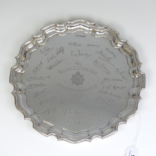 35 - A George V silver Salver, by Walker & Hall, hallmarked Sheffield, 1933, of shaped circular form ... 