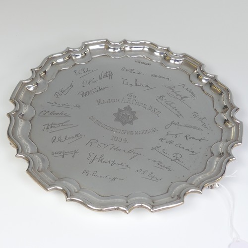 35 - A George V silver Salver, by Walker & Hall, hallmarked Sheffield, 1933, of shaped circular form ... 