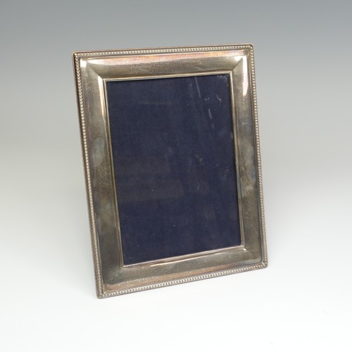 65 - An Elizabeth II silver mounted Easel Frame, hallmarked Sheffield, 2003, with beaded rim, apertu... 