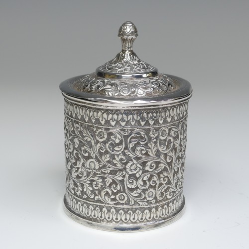 41 - An Indian circular silver Pot and Cover, with all over scrolling foliate decoration, the removable c... 