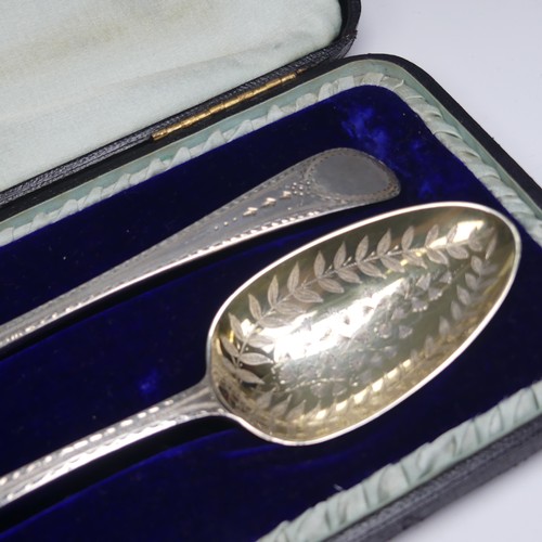 18 - A cased matched pair of George III silver Serving Spoons, one John Lambe, London 1788, the other Geo... 