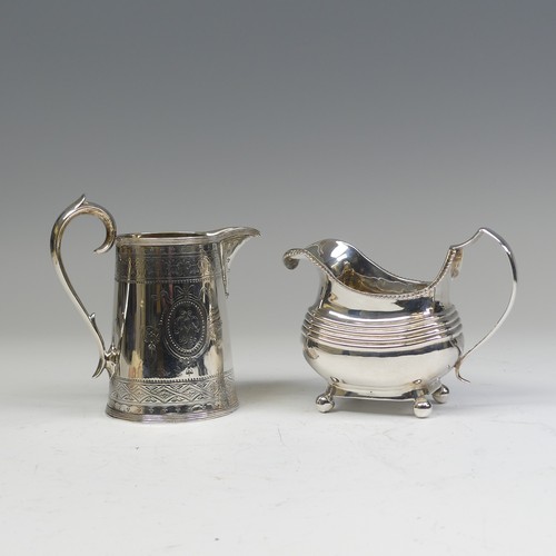 49 - A George III silver Cream Jug, makers mark SW, hallmarked London 1812, of rounded rectangular form w... 