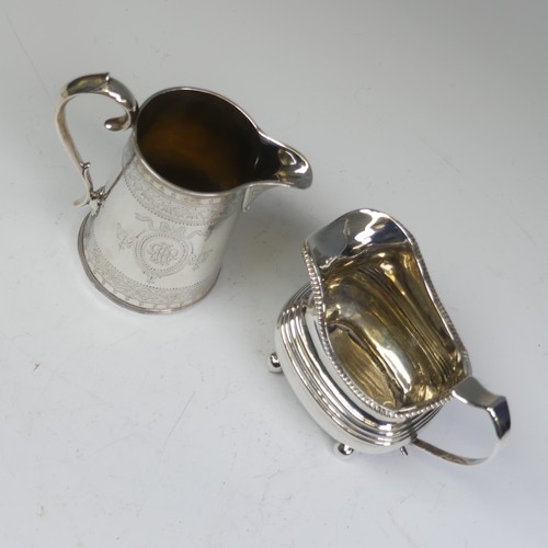 49 - A George III silver Cream Jug, makers mark SW, hallmarked London 1812, of rounded rectangular form w... 