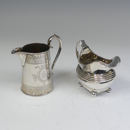 49 - A George III silver Cream Jug, makers mark SW, hallmarked London 1812, of rounded rectangular form w... 