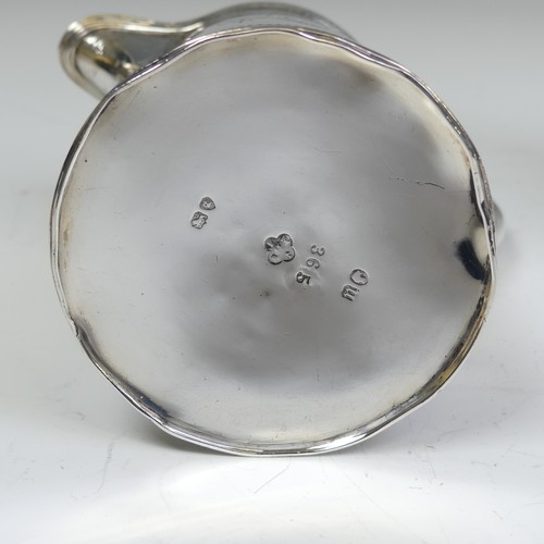 49 - A George III silver Cream Jug, makers mark SW, hallmarked London 1812, of rounded rectangular form w... 