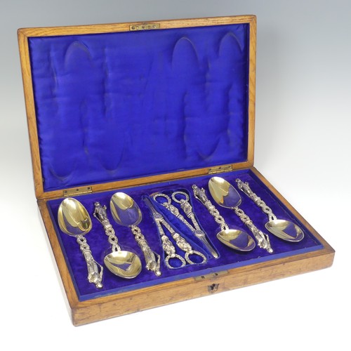 57 - A matched set of six silver gilt Serving Spoons with a pair of Grape Scissors, the spoons by He... 