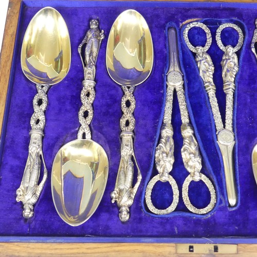 57 - A matched set of six silver gilt Serving Spoons with a pair of Grape Scissors, the spoons by He... 