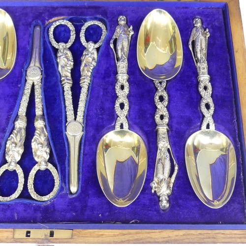 57 - A matched set of six silver gilt Serving Spoons with a pair of Grape Scissors, the spoons by He... 