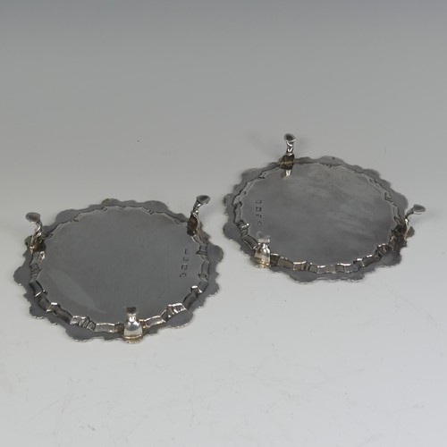 26 - A pair of George III silver Waiters, by Ebenezer Coker, hallmarked London 1772, of circular form wit... 