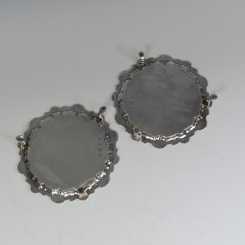 26 - A pair of George III silver Waiters, by Ebenezer Coker, hallmarked London 1772, of circular form wit... 