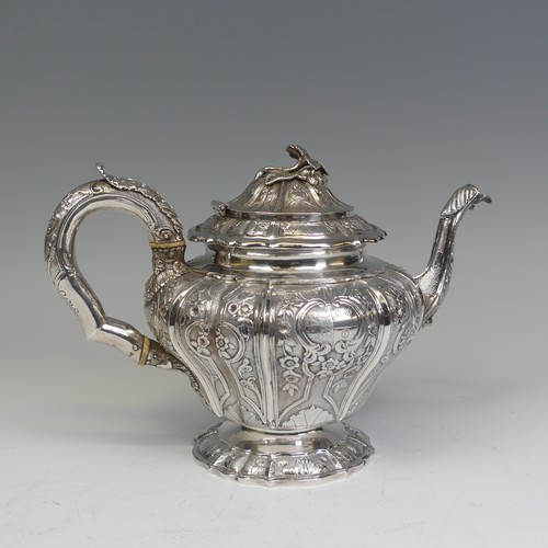 31 - An early Victorian silver melon shaped Teapot, by J E Terrey & Co., hallmarked London 1843, with... 