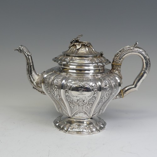 31 - An early Victorian silver melon shaped Teapot, by J E Terrey & Co., hallmarked London 1843, with... 