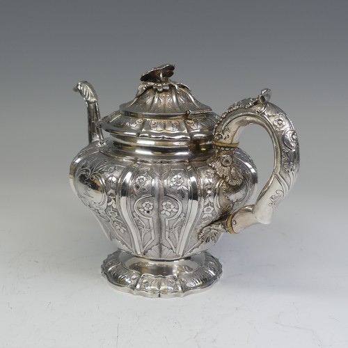 31 - An early Victorian silver melon shaped Teapot, by J E Terrey & Co., hallmarked London 1843, with... 