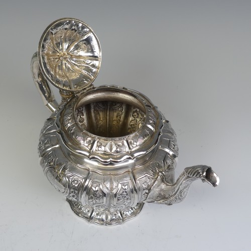 31 - An early Victorian silver melon shaped Teapot, by J E Terrey & Co., hallmarked London 1843, with... 