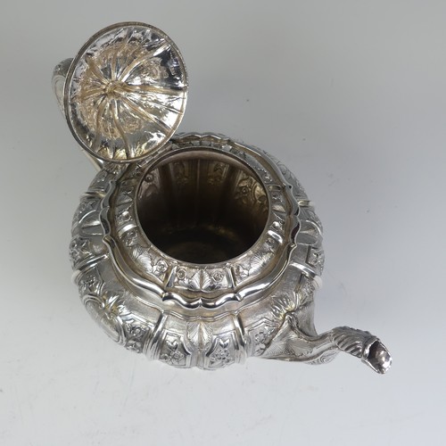 31 - An early Victorian silver melon shaped Teapot, by J E Terrey & Co., hallmarked London 1843, with... 