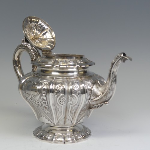 31 - An early Victorian silver melon shaped Teapot, by J E Terrey & Co., hallmarked London 1843, with... 