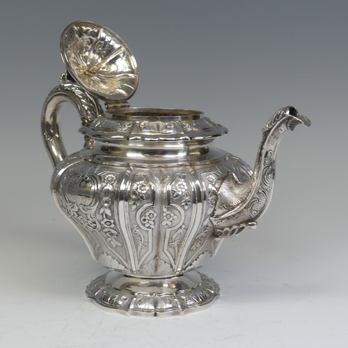 31 - An early Victorian silver melon shaped Teapot, by J E Terrey & Co., hallmarked London 1843, with... 