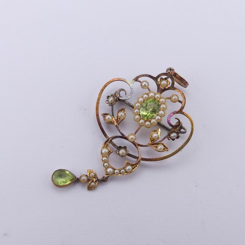 239 - An Edwardian peridot and seed pearl Pendant, in the Art Nouveau style, the central oval facetted per... 